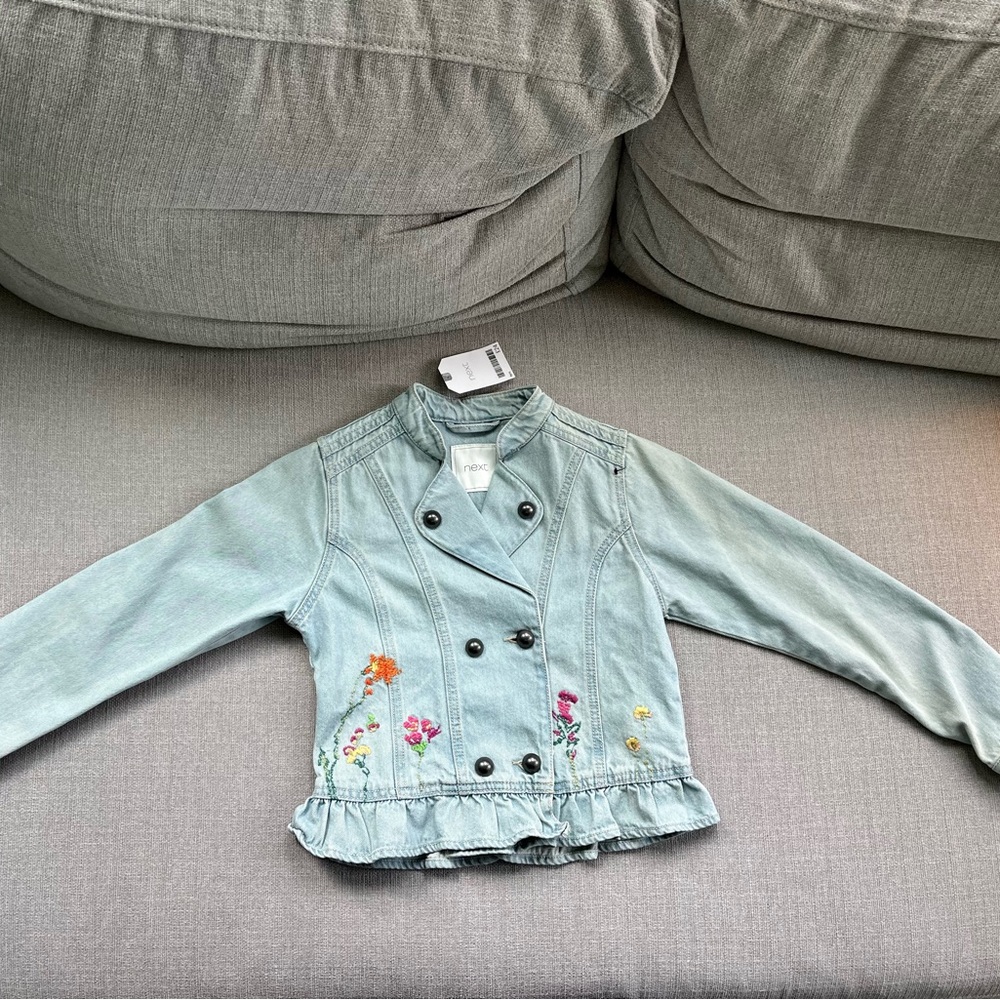 Next.co.uk girls jean jacket size 9 y/o. New with tags.